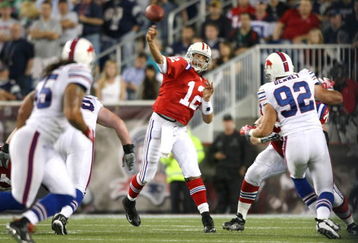 FOXBORO, MA - SEPTEMBER 14:  Quarterback Tom Brady #12 of the New England Patriots throws a pass during the second half against the Buffalo Bills on September 14, 2009 at Gillette Stadium in Foxboro, Massachusetts. (Photo by Elsa/Getty Images)