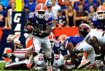 GAINESVILLE, FL - SEPTEMBER 12:  Brandon James #25 runs for a touchdown during the game against the Troy Trojans at Ben Hill Griffin Stadium on September 12, 2009 in Gainesville, Florida.  (Photo by Sam Greenwood/Getty Images)