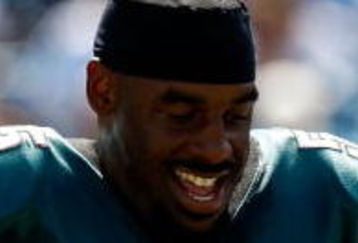 CHARLOTTE, NC - SEPTEMBER 13:  Quarterback Donovan McNabb #5 of the Philadelphia Eagles walks off the field after injuring his knee in the second half of their NFL season opener against the Carolina Panthers at Bank of America Stadium on September 13, 2009 in Charlotte, North Carolina. McNabb did not return to the game.  (Photo by Streeter Lecka/Getty Images)