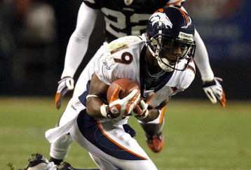 CLEVELAND - NOVEMBER 6:  Eddie Royal #19 of the Denver Broncos catches a pass in front of Brandon McDonald #22 of the Cleveland Browns during the third quarter of their NFL game at Cleveland Browns Stadium November 6, 2008 in Cleveland, Ohio.  (Photo by Matt Sullivan/Getty Images)