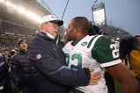 SEATTLE - DECEMBER 21: Head coach Mike Holmgrem of the Seattle Seahawks is congratulated by Ty Law #22 of New York Jets on December 21, 2008 at Qwest Field in Seattle, Washington. The Seahawks defeated the Jets 13-3. (Photo by Otto Greule Jr/Getty Images)