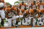 AUSTIN, TX - SEPTEMBER 5:  Members of the Texas Longhorns bow their heads together prior to their game against the Louisiana Monroe Warhawks on September 5, 2009 at Darrell K Royal-Texas Memorial Stadium in Austin, Texas. The Longhorns defeated the Warhawks 59-20. (Photo by Brian Bahr/Getty Images)