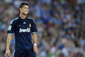 BARCELONA, SPAIN - SEPTEMBER 12:  Cristiano Ronaldo of Real Madrid smiles during the La Liga match between Espanyol and Real Madrid at the  Nuevo Estadio de Cornella-El Prat stadium on September 12, 2009 in Barcelona, Spain.  (Photo by Denis Doyle/Getty Images)