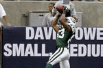 HOUSTON - SEPTEMBER 13:  Wide receiver Chansi Stuckey #83 of the New York Jets goes up for a touchdown reception in the second quarter against the Houston Texans at Reliant Stadium on September 13, 2009 in Houston, Texas.  (Photo by Bob Levey/Getty Images)