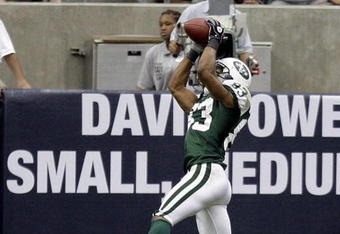 HOUSTON - SEPTEMBER 13:  Wide receiver Chansi Stuckey #83 of the New York Jets goes up for a touchdown reception in the second quarter against the Houston Texans at Reliant Stadium on September 13, 2009 in Houston, Texas.  (Photo by Bob Levey/Getty Images)