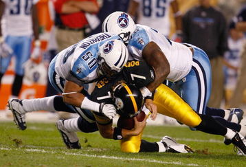 PITTSBURGH, PA - SEPTEMBER 10: Quarterback Ben Roethlisberger #7 of the Pittsburgh Steelers is sacked by David Thorton and Jovan Haye #75 of the Tennessee Titans at Heinz Field on September 10, 2009 in Pittsburgh, Pennsylvania. The Steelers defeated the Titans 13-10 in overtime. (Photo by Scott Boehm/Getty Images)
