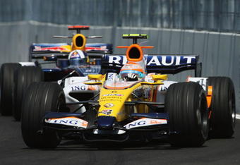 VALENCIA, SPAIN - AUGUST 24:  Nelson Piquet Jnr of Brazil and Renault and David Coulthard of Great Britain and Red Bull Racing in action during the European Formula One Grand Prix at the Valencia Street Circuit on August 24, 2008, in Valencia, Spain.  (Photo by Bryn Lennon/Getty Images)