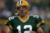 GREEN BAY, WI - SEPTEMBER 13: Aaron Rodgers #12 of the Green Bay Packers participates in warm-ups before a game against the Chicago Bears on September 13, 2009 at Lambeau Field in Green Bay, Wisconsin. (Photo by Jonathan Daniel/Getty Images)