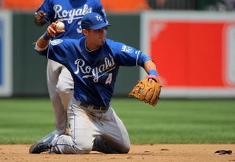 BALTIMORE - JULY 30:  Third baseman Alex Gordon #4 of the Kansas City Royals throws out a runner as he plays defense against the Baltimore Orioles during MLB action at Oriole Park at Camden Yards on July 30, 2009 in Baltimore, Maryland. The Orioles defeated the Royals 7-3.  (Photo by Doug Pensinger/Getty Images)