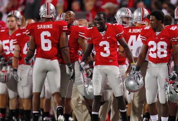 COLUMBUS, OH - SEPTEMBER 12: Quarterback Terrelle Pryor #2 of the Ohio State Buckeyes celebrates after teammate Etienne Sabino #6 scores on a third quarter safety against the USC Trojans at Ohio Stadium on September 12, 2009 in Columbus, Ohio. (Photo by Gregory Shamus/Getty Images)