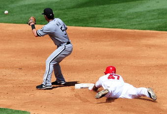 ANAHEIM, CA - SEPTEMBER 13: Jayson Nix #5 of the Chicago White Sox misses a play at second base against Howie Kendrick #47 of the Los Angeles Angels of Aneheim at Angel Stadium on September 13, 2009 in Anaheim, California.  (Photo by Jacob de Golish/Getty Images)