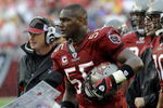 TAMPA, FL - NOVEMBER 30: Linebacker Derrick Brooks #55 of the Tampa Bay Buccaneers watches play against the New Orleans Saints at Raymond James Stadium on November 30, 2008 in Tampa, Florida.  (Photo by Al Messerschmidt/Getty Images) 