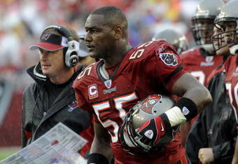 TAMPA, FL - NOVEMBER 30: Linebacker Derrick Brooks #55 of the Tampa Bay Buccaneers watches play against the New Orleans Saints at Raymond James Stadium on November 30, 2008 in Tampa, Florida.  (Photo by Al Messerschmidt/Getty Images) 