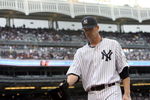 NEW YORK - SEPTEMBER 12:  A.J. Burnett #34 of the New York Yankees walks to the dugout against the Baltimore Orioles on September 12, 2009 at Yankee Stadium in the Bronx borough of New York City.  (Photo by Nick Laham/Getty Images)