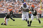 CLEVELAND - SEPTEMBER 13:  Adrian Peterson #28 of the Minnesota Vikings runs by Brodney Pool #21 and Corey Willams #99 of the Cleveland Brwons at Cleveland Browns Stadium on September 13, 2009 in Cleveland, Ohio.  (Photo by Matt Sullivan/Getty Images)