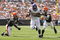 CLEVELAND - SEPTEMBER 13:  Adrian Peterson #28 of the Minnesota Vikings runs by Brodney Pool #21 and Corey Willams #99 of the Cleveland Brwons at Cleveland Browns Stadium on September 13, 2009 in Cleveland, Ohio.  (Photo by Matt Sullivan/Getty Images)