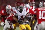 COLUMBUS, OH - SEPTEMBER 13:  Joe McKnight #4 of the Southern California Trojans looks for running room while playing the Ohio State Buckeyes on September 13, 2009 at Ohio Stadium in Columbus, Ohio. USC won the game 18-15. (Photo by Gregory Shamus/Getty Images)
