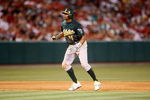 ANAHEIM, CA - AUGUST 29:  Rajai Davis #11 of the Oakland Athletics leads off of second base against the Los Angeles Angels of Anaheim at Angel Stadium on August 29, 2009 in Anaheim, California.  (Photo by Jeff Gross/Getty Images)