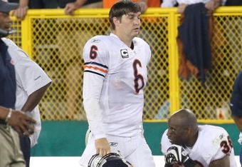 GREEN BAY, WI - SEPTEMBER 13: Jay Cutler #6 of the Chicago Bears walks back to the bench after throwing a career-high 4th interception against the Green Bay Packers on September 13, 2009 at Lambeau Field in Green Bay, Wisconsin. The Packers defeated the Bears 21-15. (Photo by Jonathan Daniel/Getty Images)