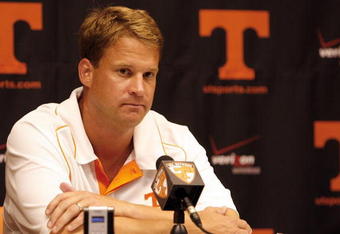 KNOXVILLE, TN - SEPTEMBER 12: Lane Kiffin, head coach of the Tennessee Volunteers talks in the press conference after a game against the UCLA Bruins on September 12, 2009 at Neyland Stadium in Knoxville, Tennessee. UCLA beat Tennessee 19-15. (Photo by Joe Murphy/Getty Images)