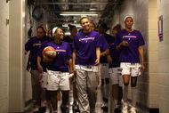 PHOENIX - AUGUST 21:  Temeka Johnson #2 and Kelly Mazzante #33 of the Phoenix Mercury lead teammates out onto the court before the WNBA game against the Washington Mystics at US Airways Center on August 21, 2009 in Phoenix, Arizona. NOTE TO USER: User expressly acknowledges and agrees that, by downloading and or using this photograph, User is consenting to the terms and conditions of the Getty Images License Agreement.  (Photo by Christian Petersen/Getty Images)