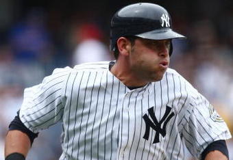 NEW YORK - JUNE 04:  Francisco Cervelli #29 of the New York Yankees runs to first base against the Texas Rangers during their game on June 4, 2009 at Yankee Stadium in the Bronx borough of New York City.  (Photo by Chris McGrath/Getty Images)
