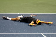 NEW YORK - SEPTEMBER 14: Juan Martin Del Potro of Argentina celebrates championship point after defeating Roger Federer of Switzerland in the Men's Singles final on day fifteen of the 2009 U.S. Open at the USTA Billie Jean King National Tennis Center on September 14, 2009 in the Flushing neighborhood of the Queens borough of New York City. Del Potro defeated Federer 3-6, 7-6 (7), 4-6, 7-6 (7), 6-2. (Photo by Nick Laham/Getty Images)