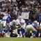IRVING, TX - DECEMBER 14: Quarterback Tony Romo #9 of the Dallas Cowboys calls the play at the line of scrimmage against the New York Giants at Texas Stadium on December 14, 2008 in Irving, Texas. (Photo by Ronald Martinez/Getty Images)
