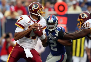 EAST RUTHERFORD, NJ - SEPTEMBER 13:  Jason Campbell #17 of the Washington Redskins looks to throw a pass against the New York Giants on September 13, 2009 at Giants Stadium in East Rutherford, New Jersey.  (Photo by Jim McIsaac/Getty Images)