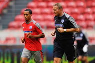 AMSTERDAM, NETHERLANDS - AUGUST 11:  Theo Walcott trains away from the rest of the squad during the England Training Session at the Amsterdam Arena on August 11, 2009 in Amsterdam, Netherlands.  (Photo by Michael Regan/Getty Images)