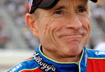 BRISTOL, TN - AUGUST 22:  Mark Martin, driver of the #5 Pop Tarts/CARQUEST Chevrolet, stands on the grid prior to the start of the NASCAR Sprint Cup Series Sharpie 500 at Bristol Motor Speedway on August 22, 2009 in Bristol, Tennessee. Martin's start from the pole position in the Sharpie 500 will be his 1000th start of his NASCAR career.  (Photo by Rusty Jarrett/Getty Images for NASCAR)