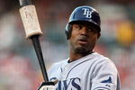 ANAHEIM, CA - AUGUST 11:   Carl Crawford #13 of the Tampa Bay Rays waits on deck in the game with the Los Angeles Angels of Anaheim at Angel Stadium August 11, 2009 in Anaheim, California.   (Photo by Stephen Dunn/Getty Images)
