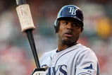 ANAHEIM, CA - AUGUST 11:   Carl Crawford #13 of the Tampa Bay Rays waits on deck in the game with the Los Angeles Angels of Anaheim at Angel Stadium August 11, 2009 in Anaheim, California.   (Photo by Stephen Dunn/Getty Images)