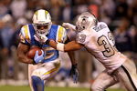 OAKLAND, CA - SEPTEMBER 14:  Antonio Gates #85 of the San Diego Chargers is tackled by Tyvon Branch #33 of the Oakland Raiders during their game on September 14, 2009 at the Oakland-Alameda County Coliseum in Oakland, California.  (Photo by Ezra Shaw/Getty Images)