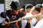 FORT LAUDERDALE, FL - FEBRUARY 26: Matt Wieters #15 of the Baltimore Orioles checks his bat in the dugout against the St. Louis Cardinals during a spring training game at Fort Lauderdale Stadium on February 26, 2009 in Fort Lauderdale, Florida. (Photo by Rob Tringali/Getty Images)
