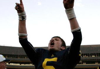ANN ARBOR, MI - SEPTEMBER 12:  Quarterback Tate Forcier #5 celebrates with seconds left in the game against Notre Dame at Michigan Stadium on September 12, 2009 in Ann Arbor, Michigan.  (Photo by Domenic Centofanti/Getty Images)