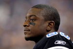 Detroit Lions wide receiver Charles Rogers watches play during  a Thanksgiving Day game, November 24, 2005, at Ford Field, Detroit.  The Atlanta Falcons defeated the Lions 27 - 7.  (Photo by Al Messerschmidt/Getty Images)
