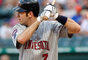 ARLINGTON, TX - JULY 17:  Catcher Joe Mauer #7 of the Minnesota Twins on July 17, 2009 at Rangers Ballpark in Arlington, Texas.  (Photo by Ronald Martinez/Getty Images)