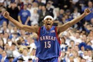 LEXINGTON, KY - JANUARY 9:  J.R. Giddens #15 of the Kansas Jayhawks celebrates during the game against the Kentucky Wildcats on January 9, 2005 at Rupp Arena in Lexington, Kentucky. Kansas defeated Kentucky 65-59.  (Photo by Andy Lyons/Getty Images)