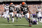 CLEVELAND - SEPTEMBER 13:  Joshua Cribbs #16 of the Cleveland Browns scores a touchdown as Eric Wright #24 celebrates against the Minnesota Vikings at Cleveland Browns Stadium on September 13, 2009 in Cleveland, Ohio.  (Photo by Matt Sullivan/Getty Images)