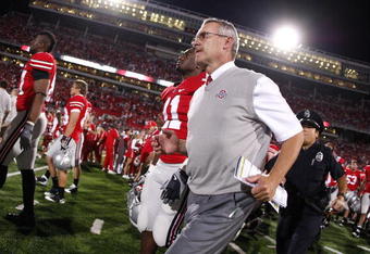 COLUMBUS, OH - SEPTEMBER 13:  Head coach Jim Tressel of the Ohio State Buckeyes leaves the field after losing 18-15 to the Southern California Trojans on September 13, 2009 at Ohio Stadium in Columbus, Ohio.  (Photo by Gregory Shamus/Getty Images)