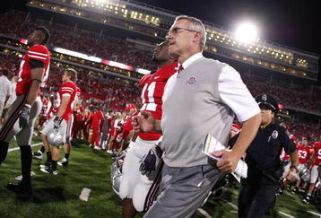 COLUMBUS, OH - SEPTEMBER 13:  Head coach Jim Tressel of the Ohio State Buckeyes leaves the field after losing 18-15 to the Southern California Trojans on September 13, 2009 at Ohio Stadium in Columbus, Ohio.  (Photo by Gregory Shamus/Getty Images)