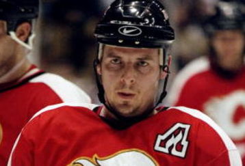 14 Jan 1999: Theoren Fleury #14 of the Calgary Flames in action during the game against the Los Angeles Kings at the Great Western Forum in Inglewood, California. The Kings defeated the Flames 3-0. Mandatory Credit: Kellie Landis  /Allsport