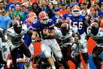 GAINESVILLE, FL - SEPTEMBER 12:  Tim Tebow #15 of the Florida Gators runs for yardage during the game against the Troy Trojans at Ben Hill Griffin Stadium on September 12, 2009 in Gainesville, Florida.  (Photo by Sam Greenwood/Getty Images)