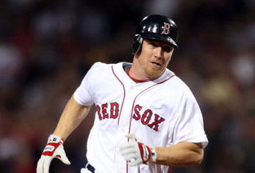 BOSTON - SEPTEMBER 15:  J.D. Drew #7 of the Boston Red Sox run the bases on his triple in the eighth inning against the Los Angeles Angels of Anaheim on September 15, 2009 at Fenway Park in Boston, Massachusetts. The Red Sox defeated the Rays 3-1.  (Photo by Elsa/Getty Images)