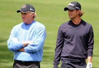 AUGUSTA, GA - APRIL 07:  Greg Norman and Adam Scott of Australia walks across a fairway during a practice round prior to the 2009 Masters Tournament at Augusta National Golf Club on April 7, 2009 in Augusta, Georgia.  (Photo by Harry How/Getty Images)