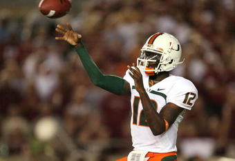 TALLAHASSEE, FL - SEPTEMBER 07:  Quarterback Jacory Harris #12 of the Miami Hurricanes throws a pass against the Florida State Seminoles at Doak Campbell Stadium on September 7, 2009 in Tallahassee, Florida.  (Photo by Doug Benc/Getty Images)