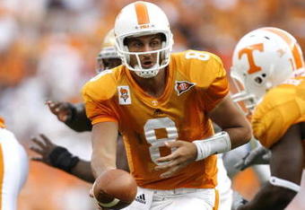 KNOXVILLE, TN - SEPTEMBER 12: Jonathan Crompton #8 of the Tennessee Volunteers looks to hand off the ball against the UCLA Bruins on September 12, 2009 at Neyland Stadium in Knoxville, Tennessee. UCLA beat Tennessee 19-15. (Photo by Joe Murphy/Getty Images)