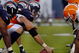 DENVER - AUGUST 25: Center Tom Nalen #66  of the Denver Broncos gets set to snap the ball during the pre-season football game against the Cleveland Browns on August 25, 2006 at Invesco Field at Mile High in Denver, Colorado.   (Photo by Steve Dykes/Getty Images)