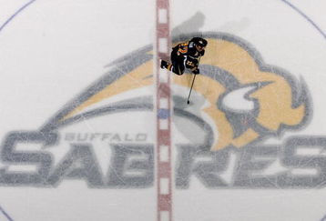 BUFFALO, NY - FEBRUARY 13: Adam Mair #22 of  the Buffalo Sabres skates over the center ice emblem during play against the Toronto Maple Leafs on February 13, 2008 at HSBC Arena in Buffalo, New York.  (Photo by Rick Stewart/Getty Images)